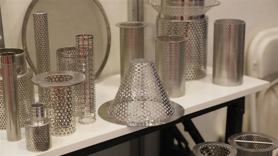 Den stansade flänsfilterpatronen i rostfritt stål